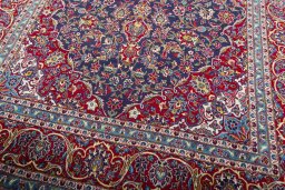 Close-up detail of 2000s Kashan rug from Iran / Persia showing Wool weave