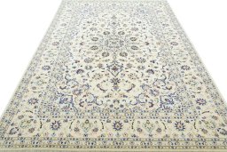 Surface texture of New Kashan rug with natural Wool and intricate pattern