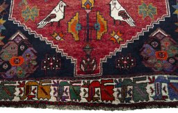 Central medallion detail of 2000s Shiraz rug from Iran / Persia