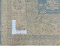 Corner detail of New Kazak rug showing border pattern and Wool pile