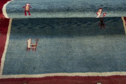 Full view of 2000s Persian Gabbeh rug from Pakistan, 198 × 155 cm in Blue tones