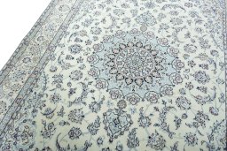 Backside of handmade 2000s Nain rug showing knot structure and weave density