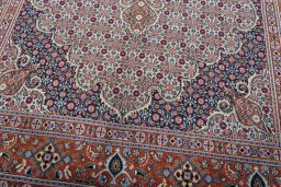 Close-up detail of 2000s Moud rug from Iran / Persia showing Wool weave