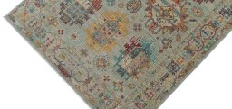 Backside of handmade New Farahan rug showing knot structure and weave density