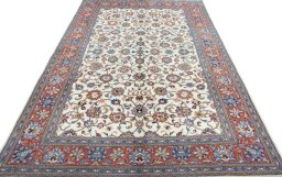 Surface texture of 2000s Sarough rug with natural Wool and intricate pattern