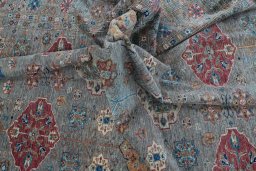 Full view of New Kazak rug from Pakistan, 357 × 253 cm in Brown tones