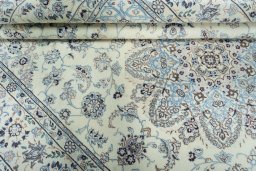 Close-up detail of 2000s Nain rug from Iran / Persia showing Wool weave