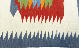 Close-up detail of New Kilim Sofre rug from Turkey showing Wool weave