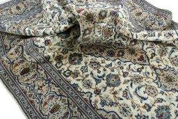 Surface texture of 2000s Kashan rug with natural Wool and intricate pattern