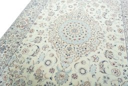Backside of handmade 2000s Nain rug showing knot structure and weave density