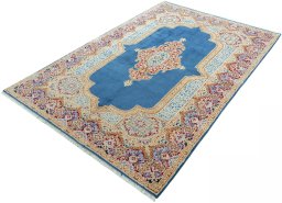 Corner detail of 1970s Kerman rug showing border pattern and Wool pile