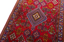 Backside of handmade 2000s Meymeh rug showing knot structure and weave density