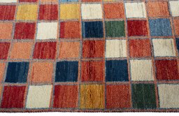 Close-up detail of 2000s Persian Gabbeh rug from Pakistan showing Wool weave