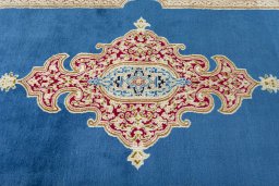 Central medallion detail of 2000s Kerman rug from Iran / Persia