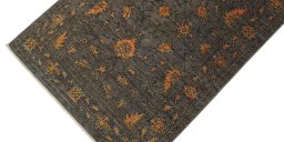 Backside of handmade New Farahan rug showing knot structure and weave density