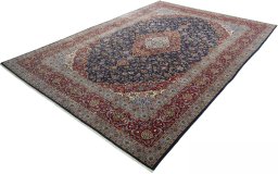 Corner detail of New Kashan rug showing border pattern and Cork pile