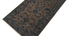 Backside of handmade New Farahan rug showing knot structure and weave density