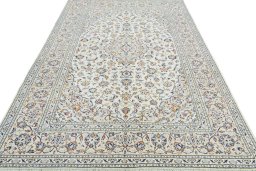 Surface texture of 2000s Kashan rug with natural Wool and intricate pattern