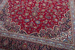Close-up detail of 2000s Kashan rug from Iran / Persia showing Wool weave