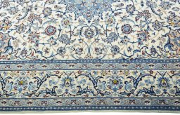 Corner detail of 2000s Nain rug showing border pattern and Wool pile