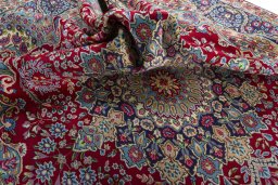 Surface texture of 1970s Kerman rug with natural Wool and intricate pattern