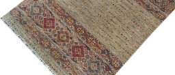 Backside of handmade New Samarkand rug showing knot structure and weave density