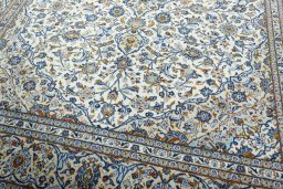 Close-up detail of 2000s Kashan rug from Iran / Persia showing Wool weave