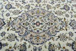 Central medallion detail of 2000s Kashan rug from Iran / Persia