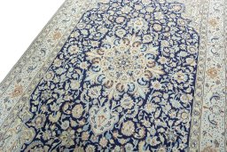 Backside of handmade 2000s Nain rug showing knot structure and weave density