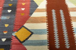 Backside of handmade New Kilim Dastan rug showing knot structure and weave density