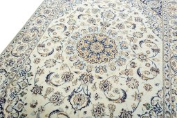 Backside of handmade 2000s Nain rug showing knot structure and weave density