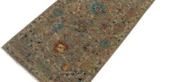 Backside of handmade New Farahan rug showing knot structure and weave density