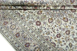 Close-up detail of 2000s Kashan rug from Iran / Persia showing Wool weave