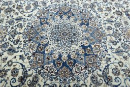 Central medallion detail of 2000s Nain rug from Iran / Persia