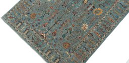 Backside of handmade New Farahan rug showing knot structure and weave density