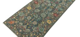 Backside of handmade New Farahan rug showing knot structure and weave density