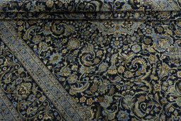 Close-up detail of New Kashan rug from Iran / Persia showing Cork weave