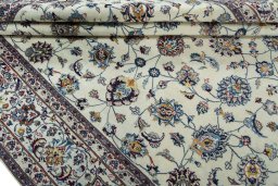 Close-up detail of 2000s Mashad rug from Iran / Persia showing Wool weave