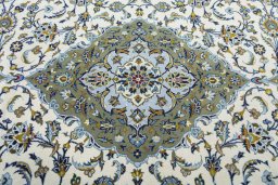Central medallion detail of 2000s Kashan rug from Iran / Persia