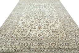 Surface texture of 2000s Kashan rug with natural Wool and intricate pattern