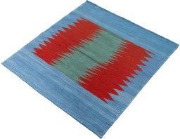 Corner detail of New Kilim Sofre rug showing border pattern and Wool pile