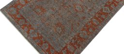 Backside of handmade New Farahan rug showing knot structure and weave density