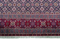 Central medallion detail of 2000s Mashad rug from Iran / Persia
