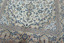 Close-up detail of 2000s Kashan rug from Iran / Persia showing Wool weave