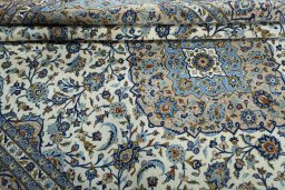 Close-up detail of 2000s Kashan rug from Iran / Persia showing Wool weave