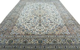 Surface texture of 2000s Kashan rug with natural Wool and intricate pattern