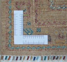Corner detail of New Samarkand rug showing border pattern and Wool pile