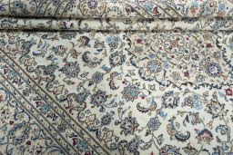Close-up detail of 2000s Kashan rug from Iran / Persia showing Wool weave