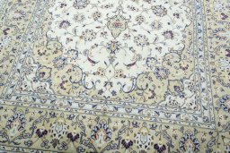 Close-up detail of 2000s Kashan rug from Iran / Persia showing Wool weave