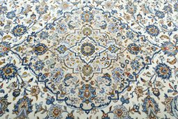 Central medallion detail of 2000s Kashan rug from Iran / Persia